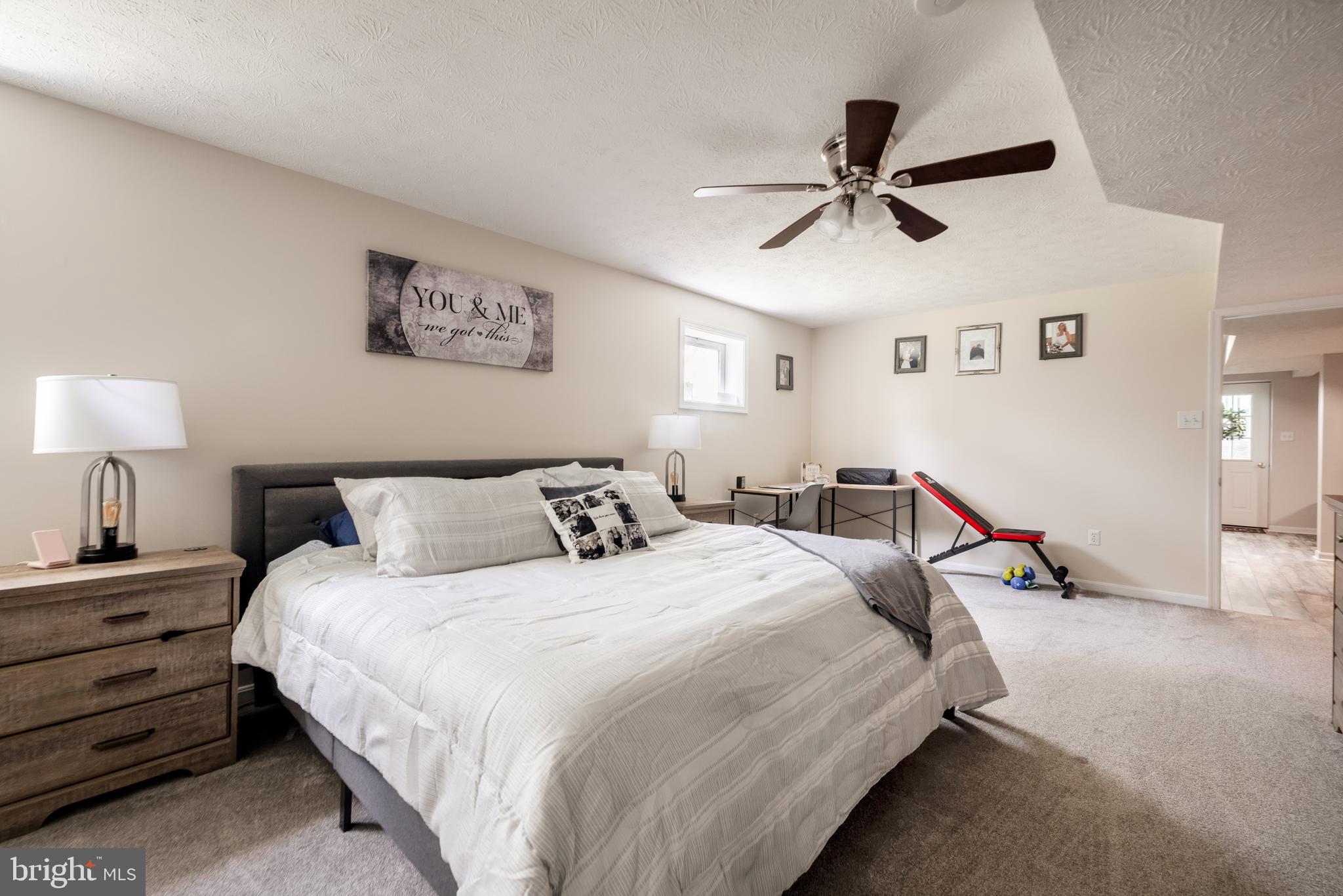 143 Club House Road Front Royal, VA 22630 - Photo 24 of 38 a bedroom with bed and a chandelier