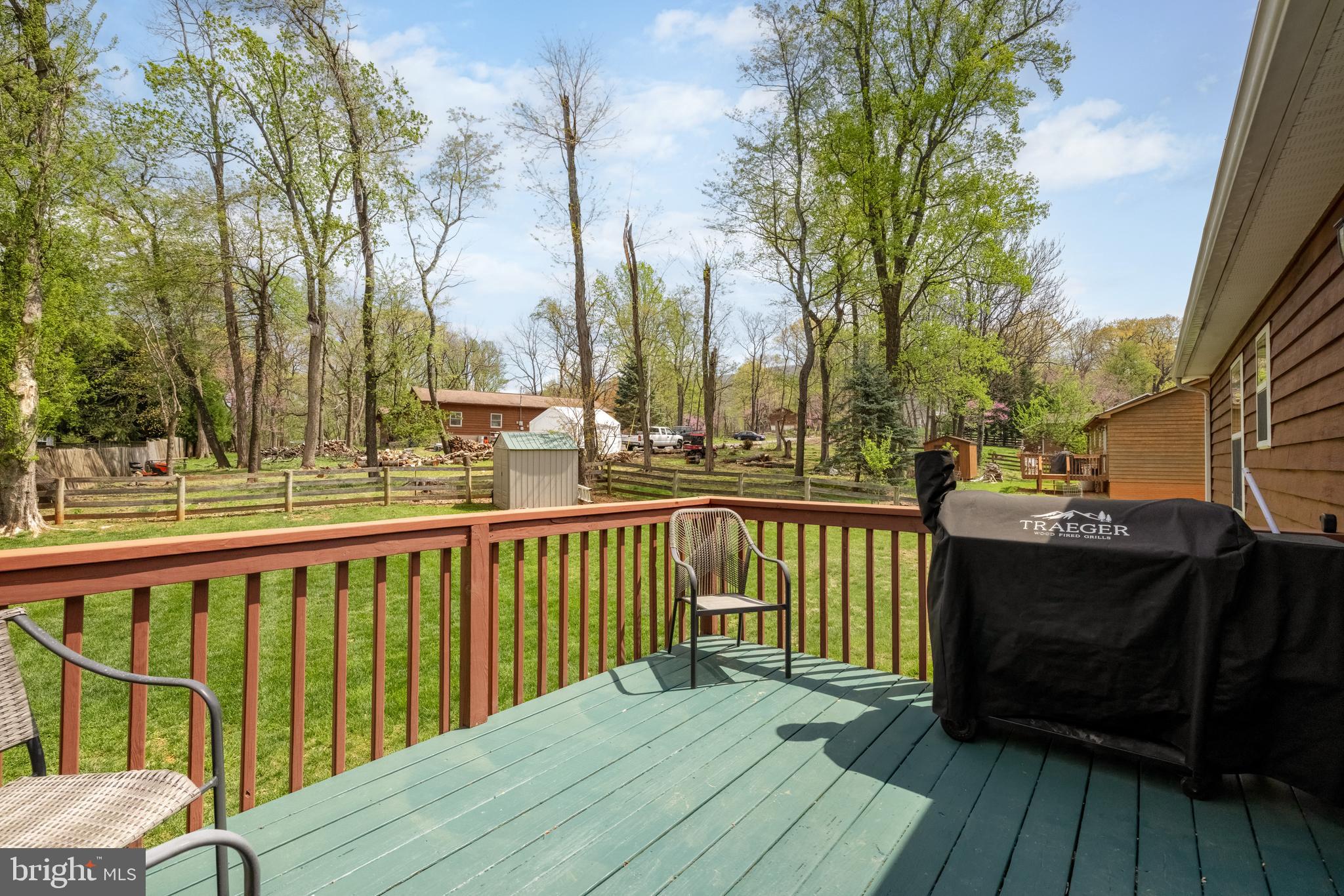 143 Club House Road Front Royal, VA 22630 - Photo 29 of 38 a view of balcony with wooden floor and outdoor seating