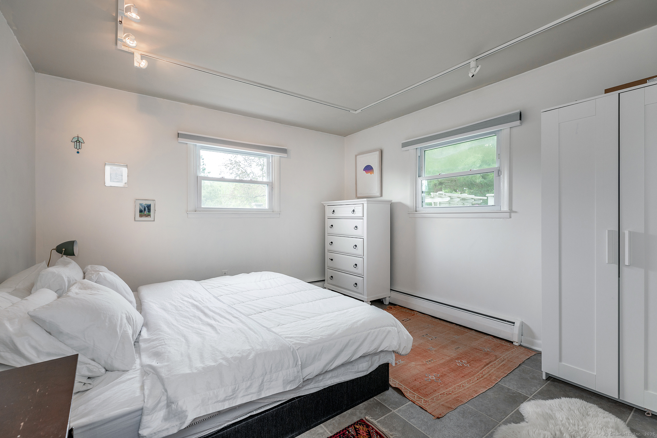 17 Rhynus Road Sharon, CT 06069 - Photo 11 of 30 a bedroom with a bed and a window