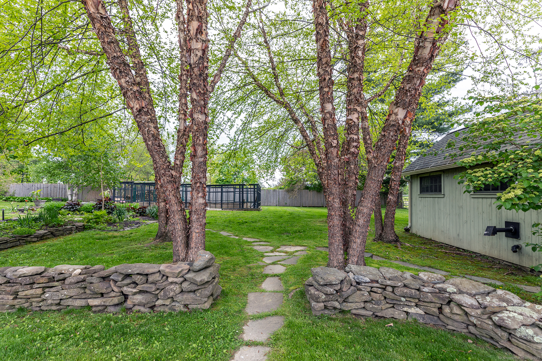 17 Rhynus Road Sharon, CT 06069 - Photo 23 of 30 a view of a garden with a tree