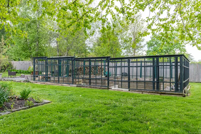 a view of a backyard with a garden