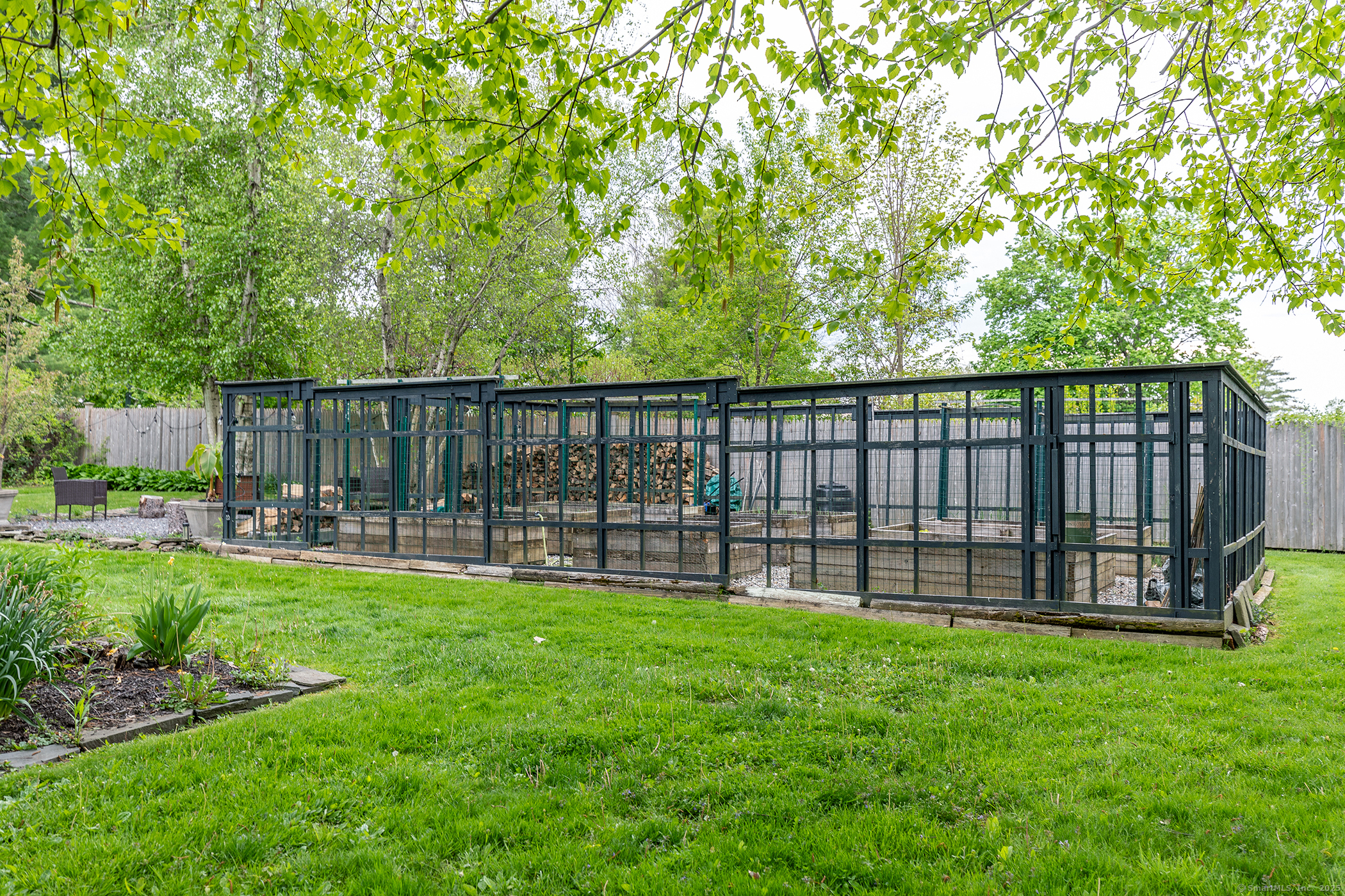 17 Rhynus Road Sharon, CT 06069 - Photo 25 of 30 a view of a backyard with a garden