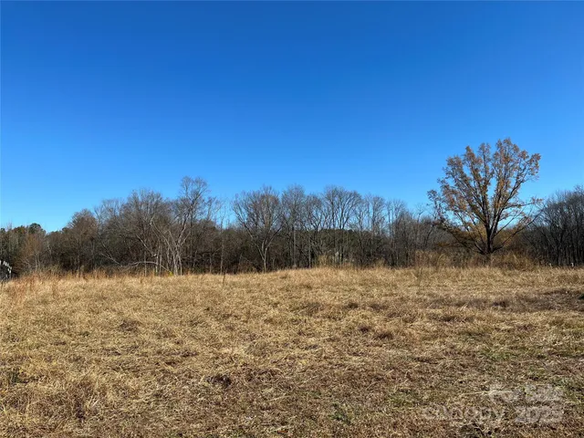 a view of lake with mountain in background