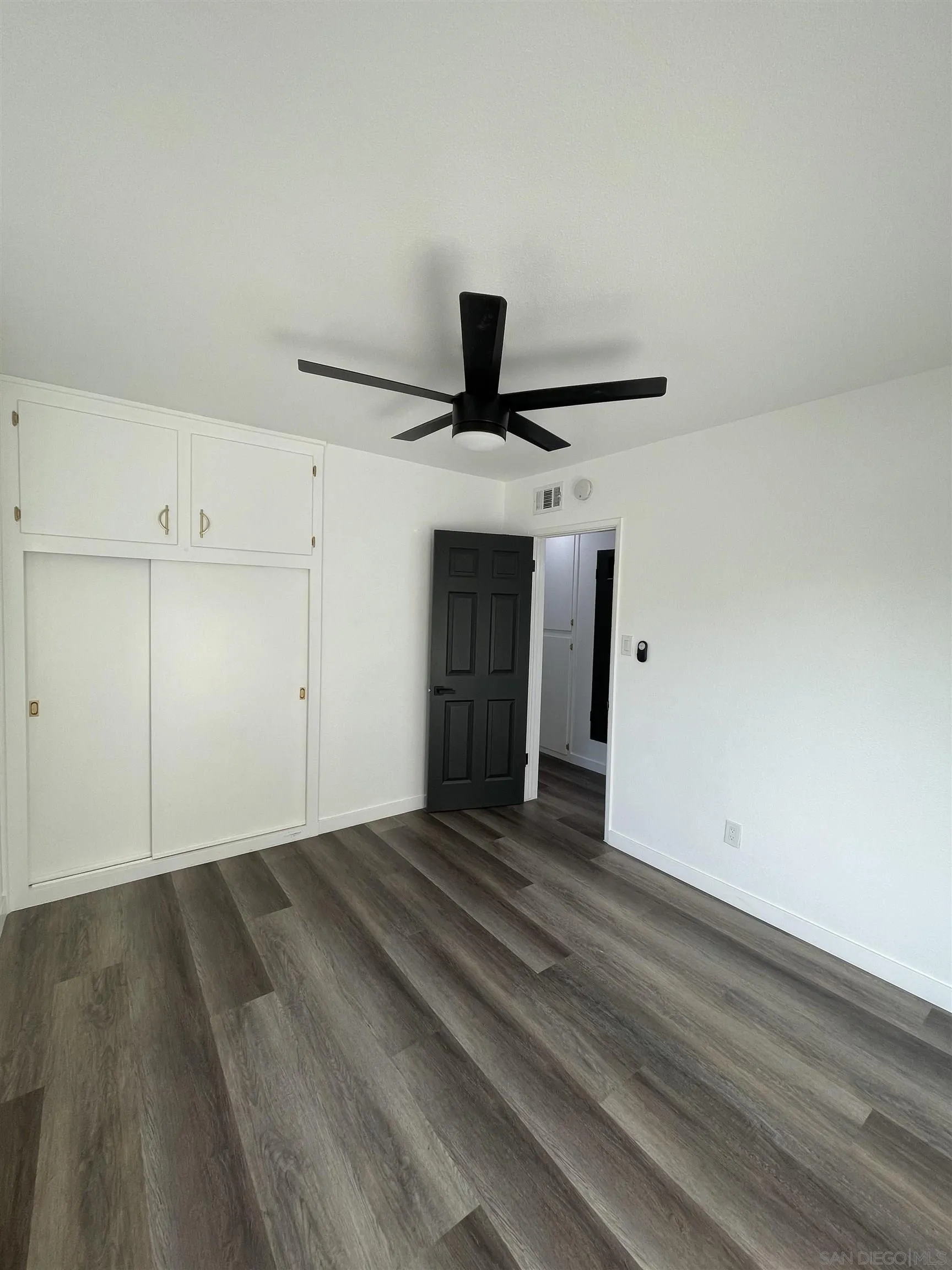 1976 3rd Street Riverside, CA 92507 - Photo 16 of 43 a view of a livingroom with wooden floor