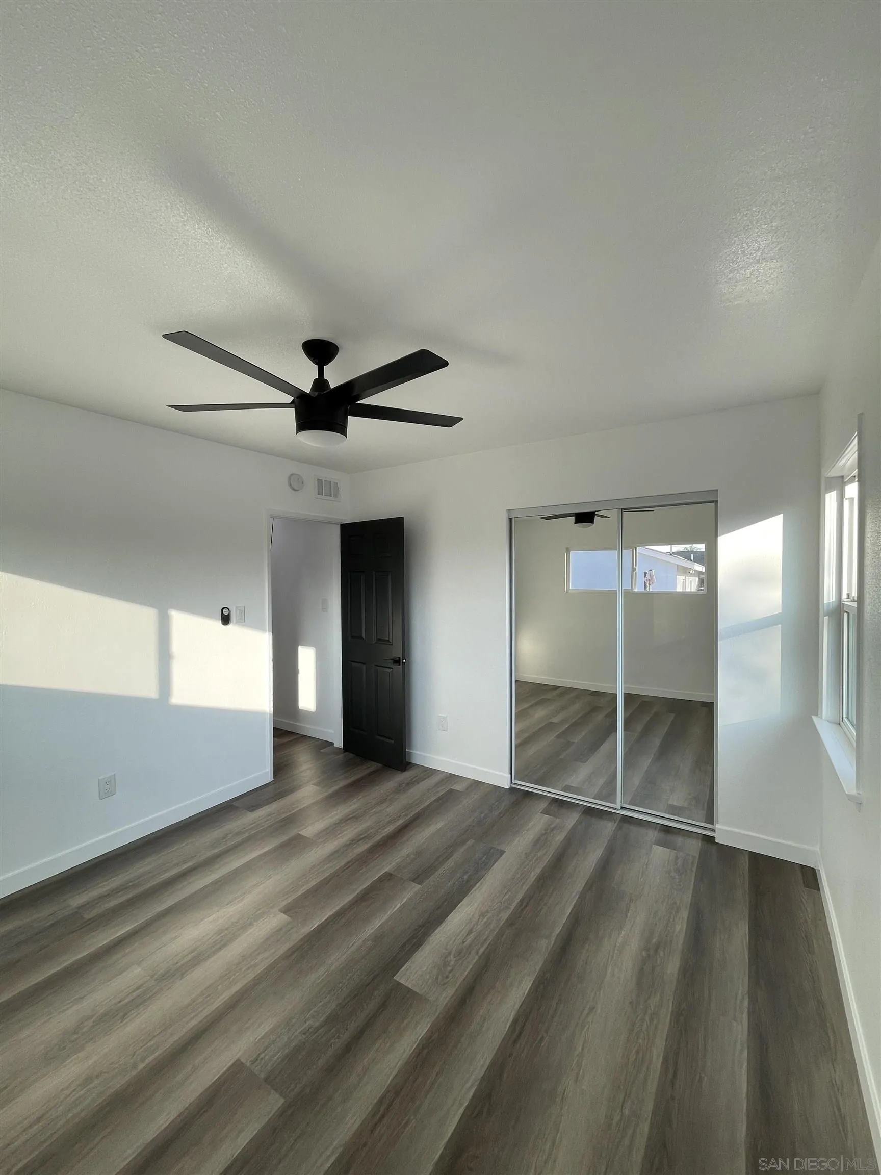 1976 3rd Street Riverside, CA 92507 - Photo 20 of 43 a view of an empty room with a window
