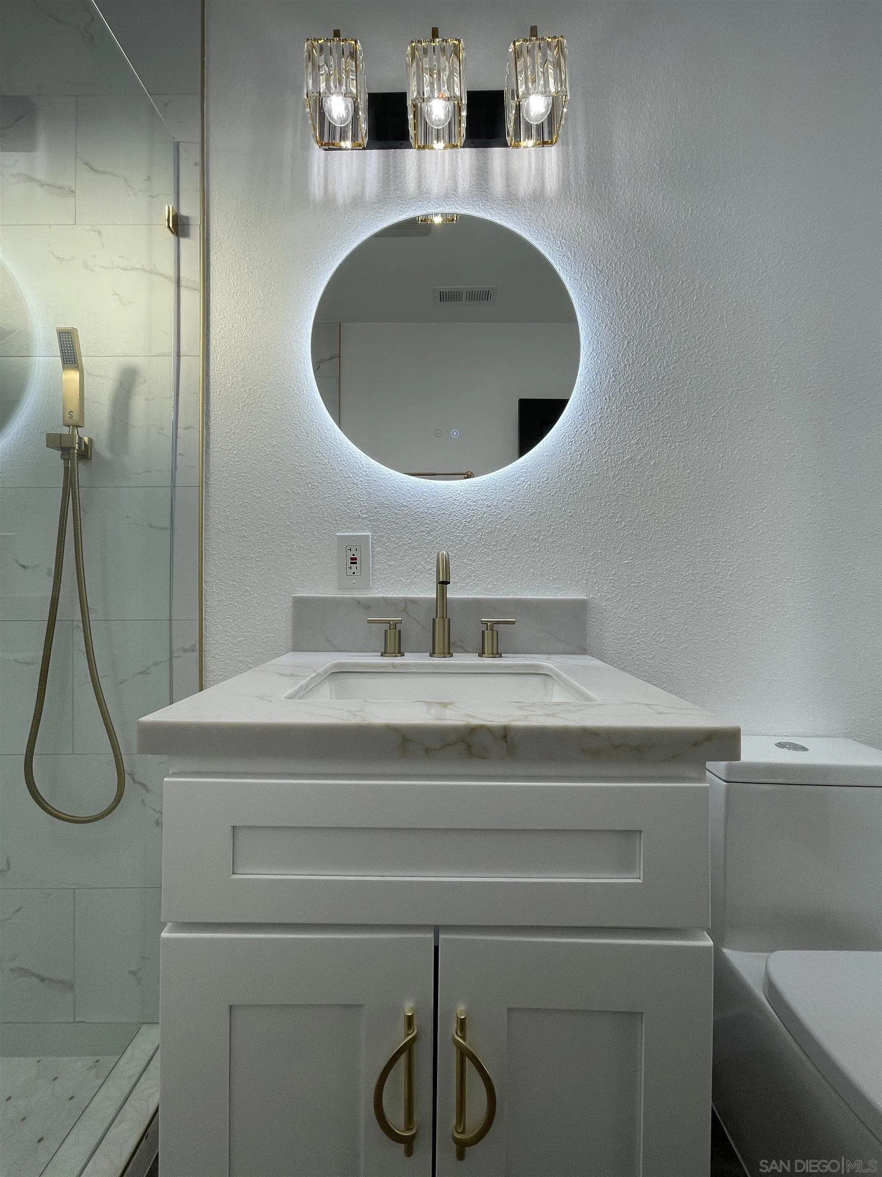 1976 3rd Street Riverside, CA 92507 - Photo 30 of 43 a bathroom with a sink and a mirror