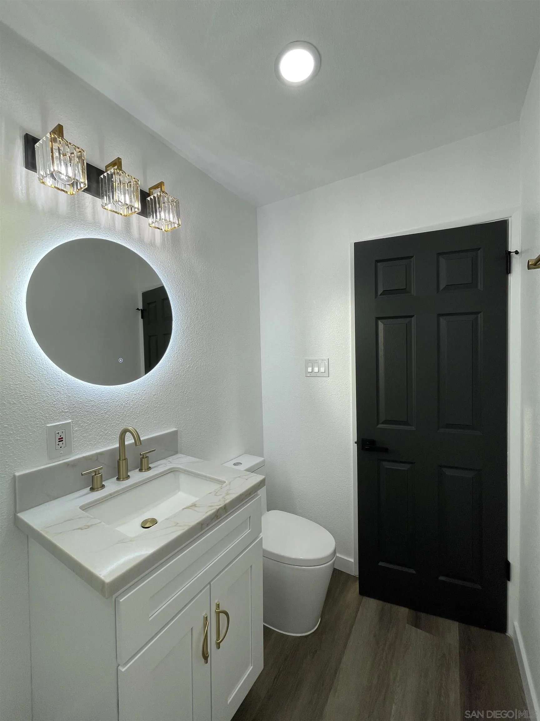 1976 3rd Street Riverside, CA 92507 - Photo 38 of 43 a bathroom with a sink and a mirror