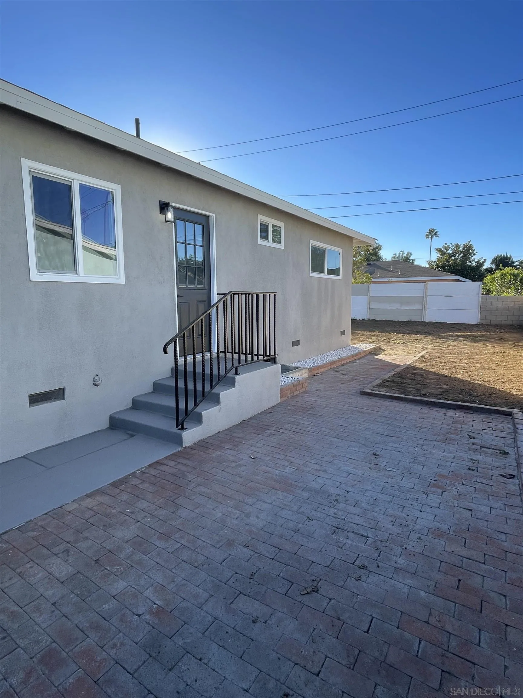 1976 3rd Street Riverside, CA 92507 - Photo 41 of 43 a view of a house with backyard and a patio