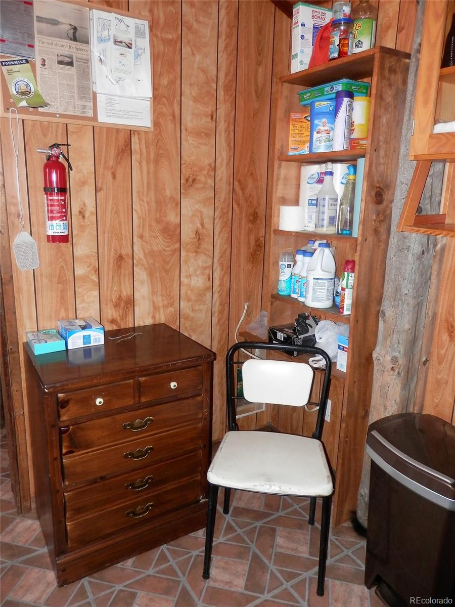 845 Montoya Road Lake George, CO 80827 - Photo 11 of 35 a room with a couch and a table in it