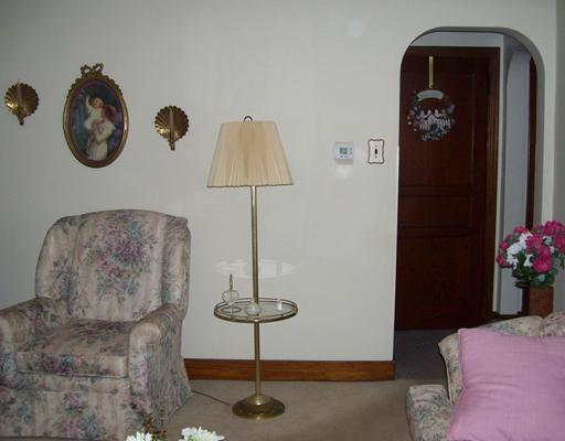 34 Rumbaugh Avenue Mount Pleasant, PA 15666 - Photo 2 of 17 Living Room. COZY 11 BY 14 LIVING ROOM WITH FIRE PLACE