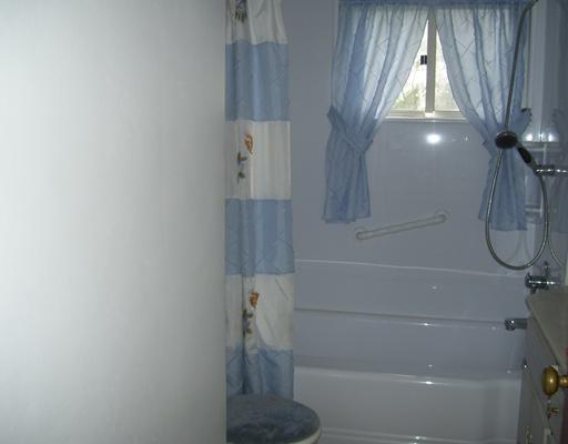34 Rumbaugh Avenue Mount Pleasant, PA 15666 - Photo 11 of 17 Full Bath. NEAT AND CLEAN UPDATTED BATH WITH GRAB BAR IN TUB AND SHOWER