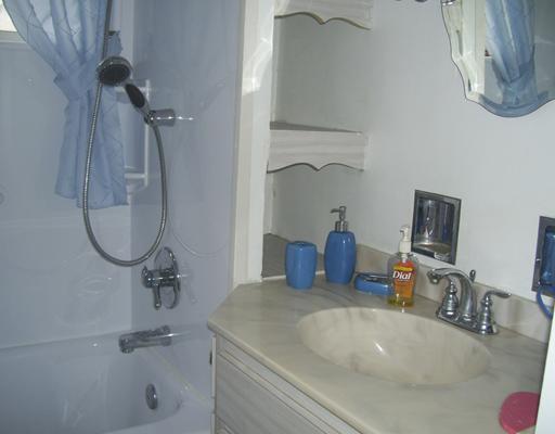 34 Rumbaugh Avenue Mount Pleasant, PA 15666 - Photo 12 of 17 Full Bath. SINGLE BOWL SINK WITH STORAGE BELOW