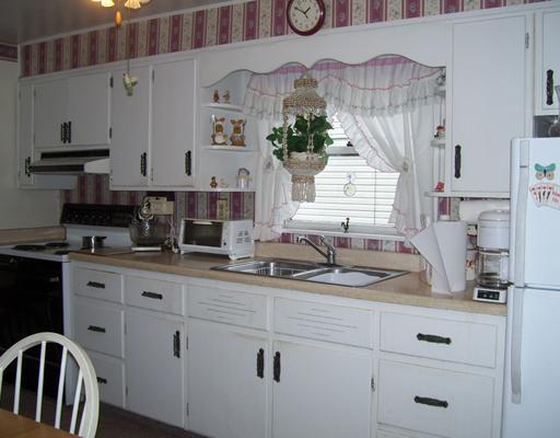 34 Rumbaugh Avenue Mount Pleasant, PA 15666 - Photo 5 of 17 Kitchen. UP DATED KITCHEN WITH 3 YEAR OLD APPLIANCES AND GREAT WHITE CABNETS