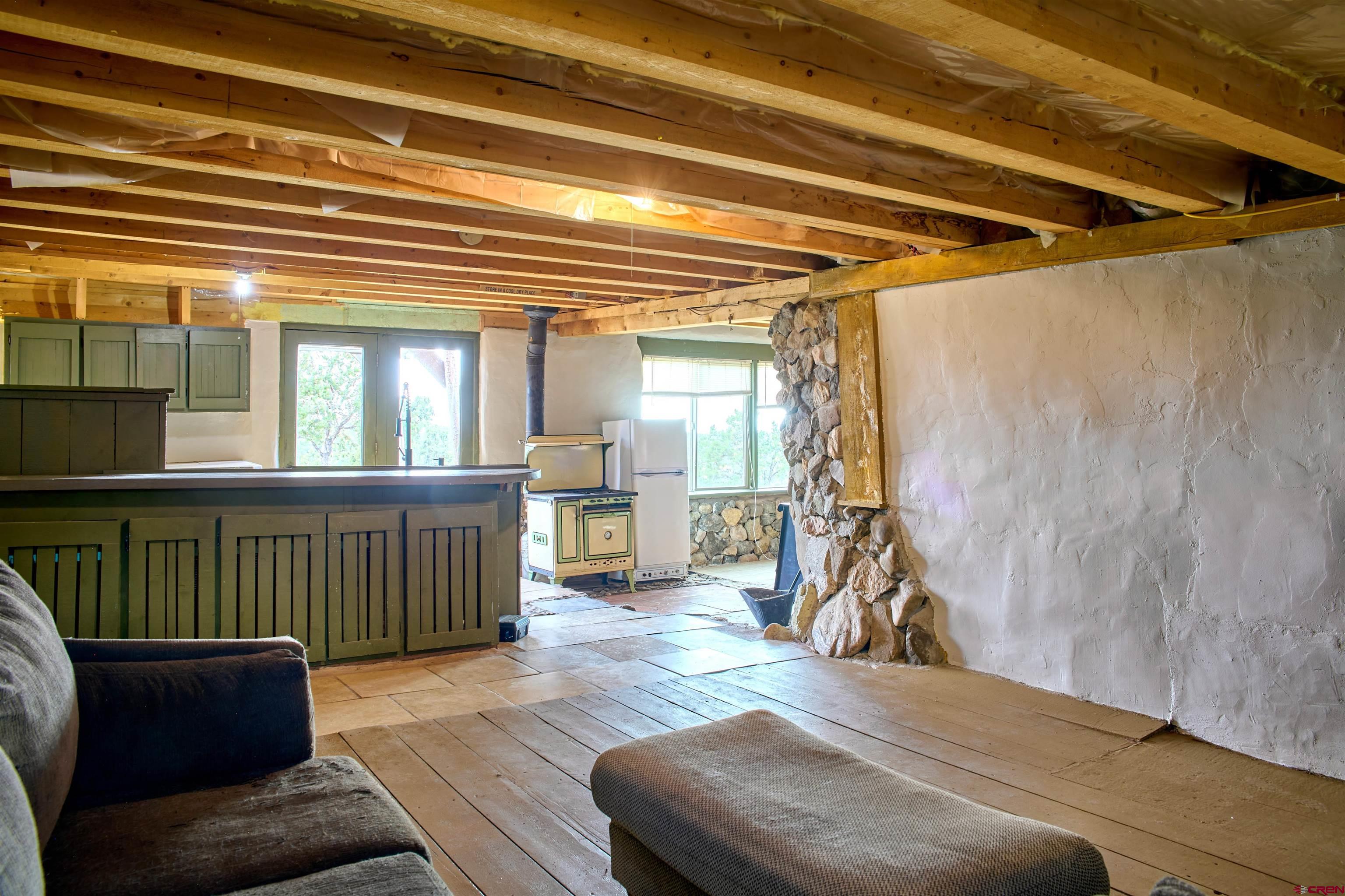 1380 Dunn Road Fort Garland, CO 81133 - Photo 17 of 45 a view of a living room and a wooden floor
