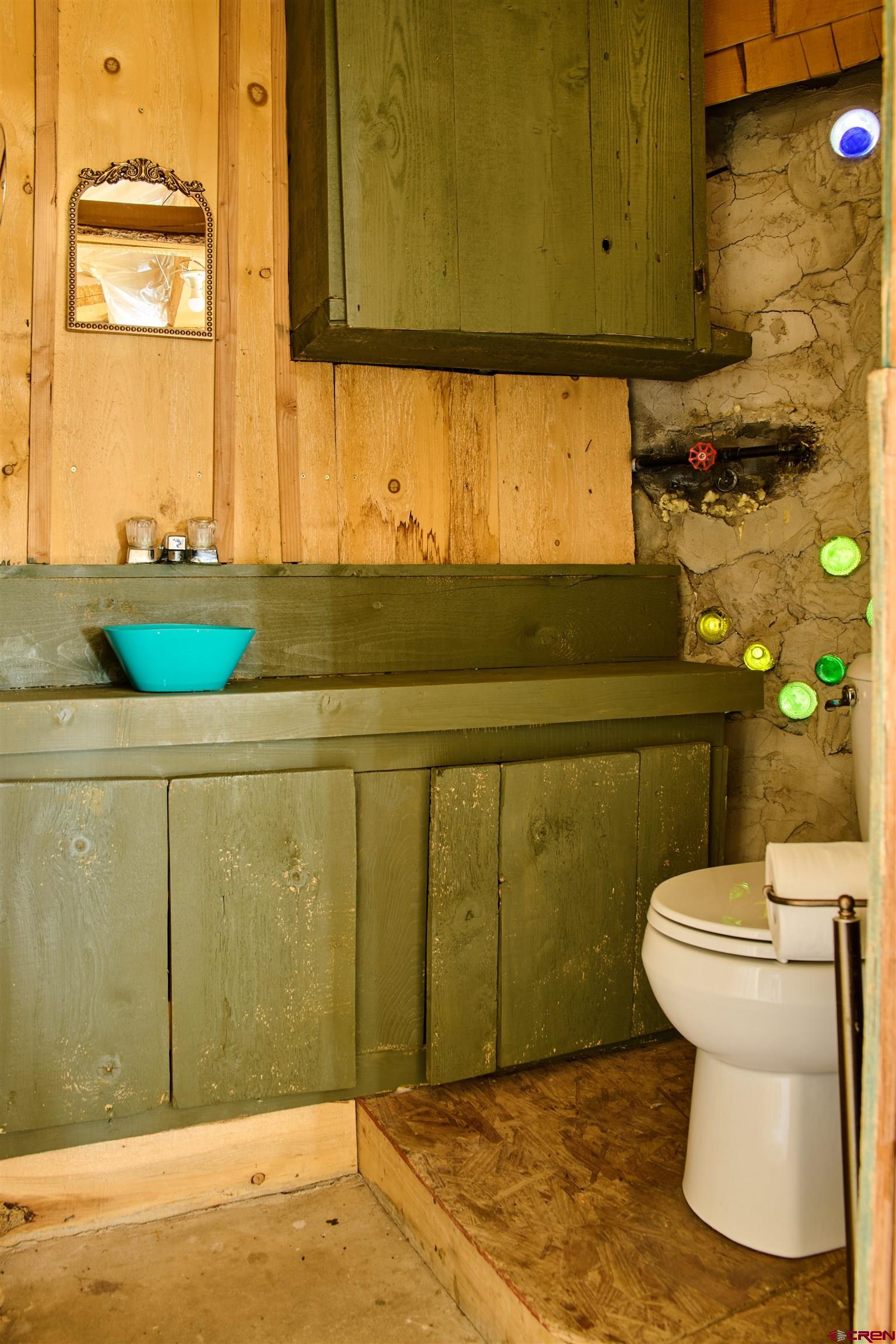 1380 Dunn Road Fort Garland, CO 81133 - Photo 21 of 45 a bathroom with a sink and a toilet