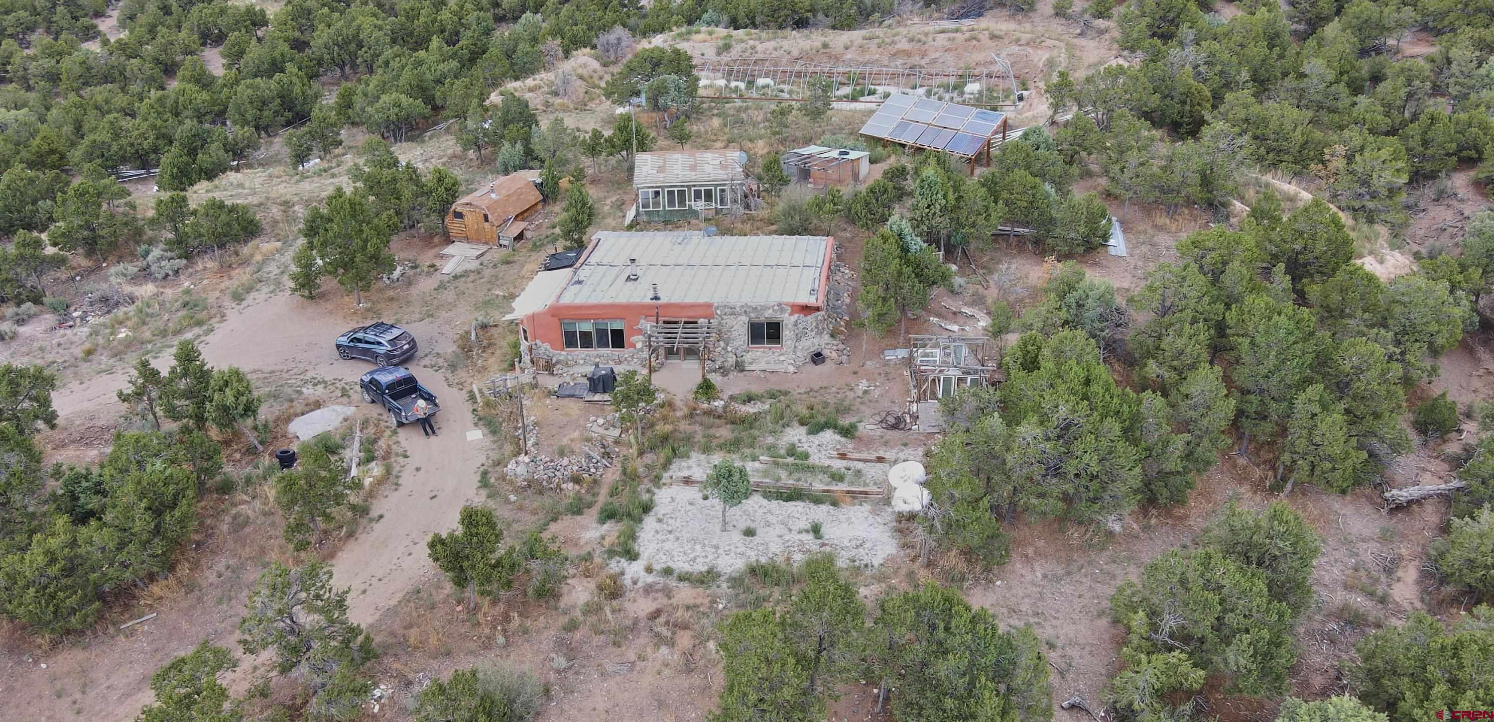 1380 Dunn Road Fort Garland, CO 81133 - Photo 32 of 45 an aerial view of residential house with outdoor space