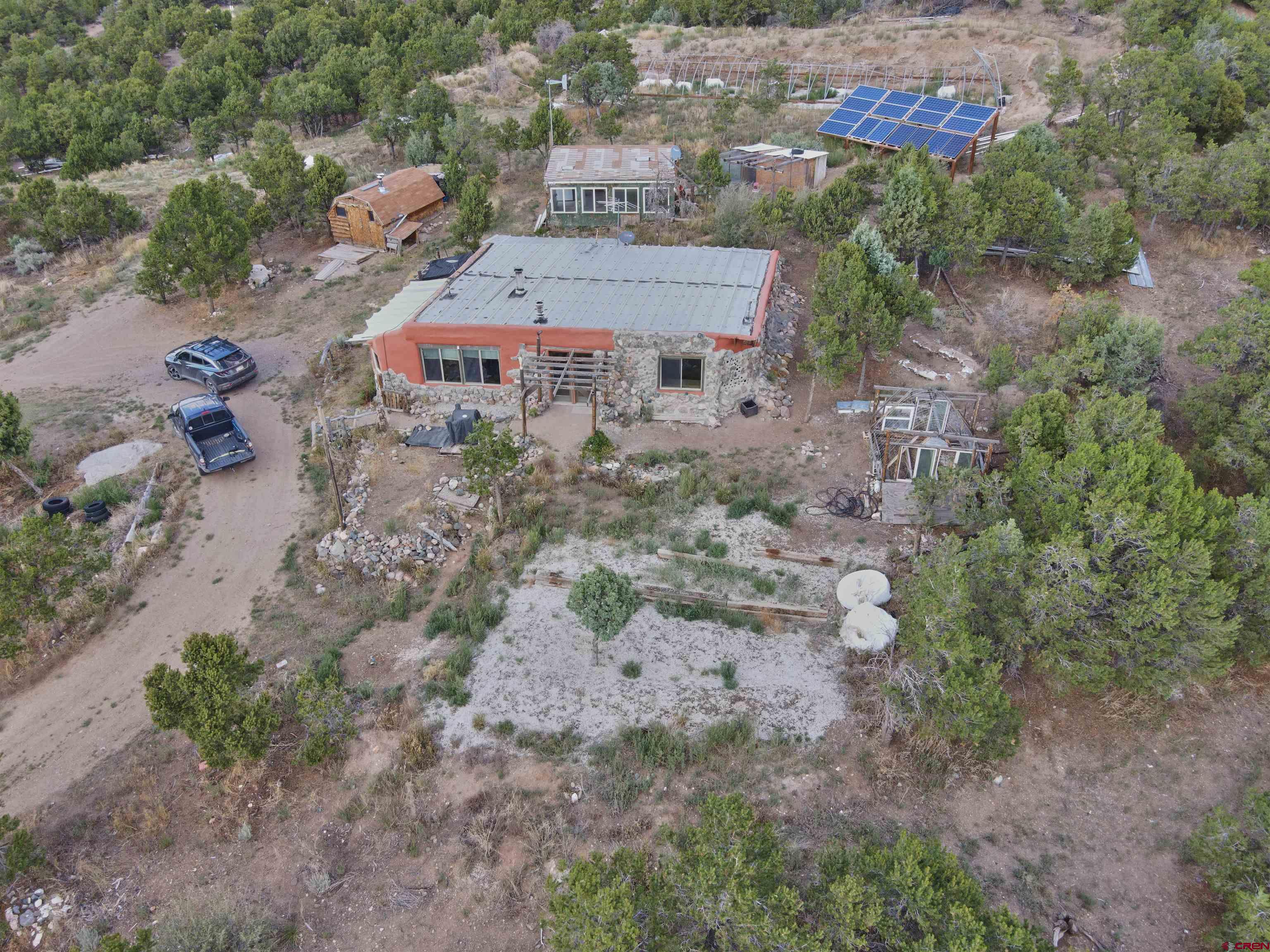 1380 Dunn Road Fort Garland, CO 81133 - Photo 43 of 45 an aerial view of a house with a yard