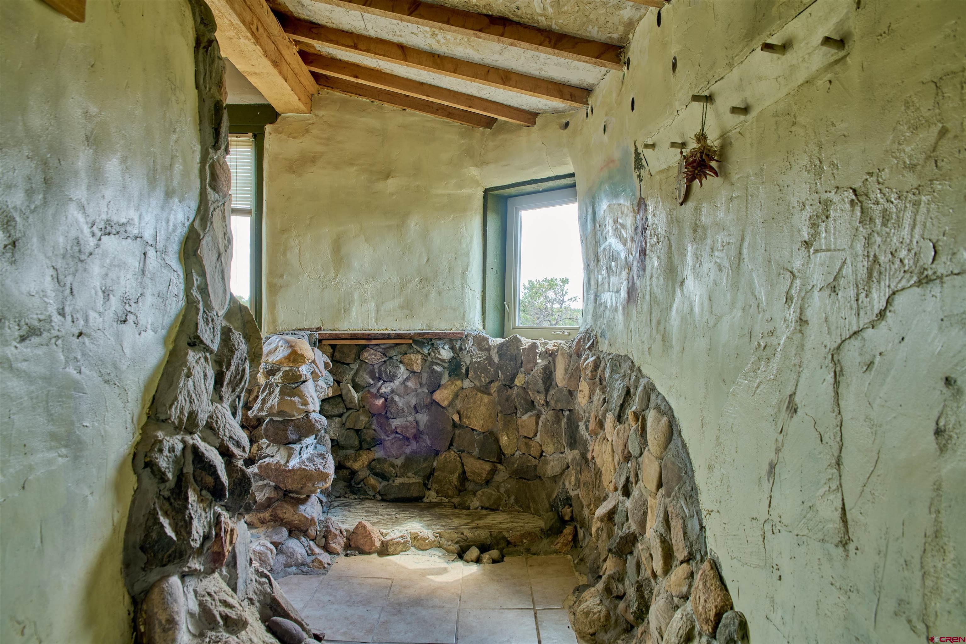 1380 Dunn Road Fort Garland, CO 81133 - Photo 7 of 45 a bathroom with a bathtub and shower