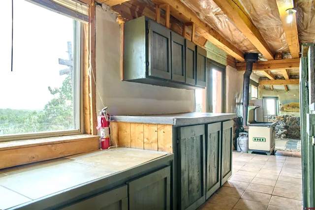 a kitchen view of a house and a window