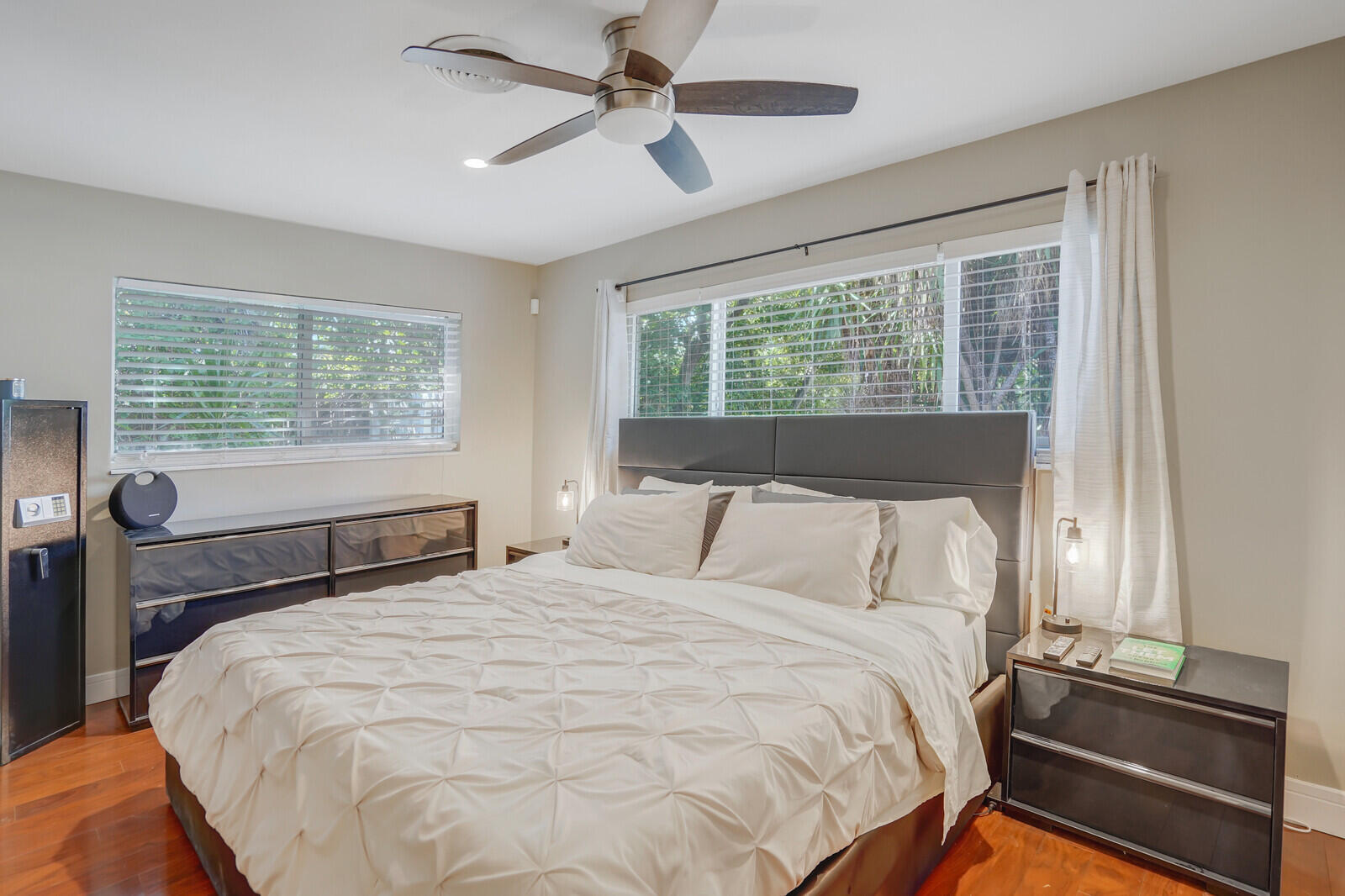 3098 Northeast 5th Avenue Boca Raton, FL 33431 - Photo 16 of 28 a bedroom with a bed and a window