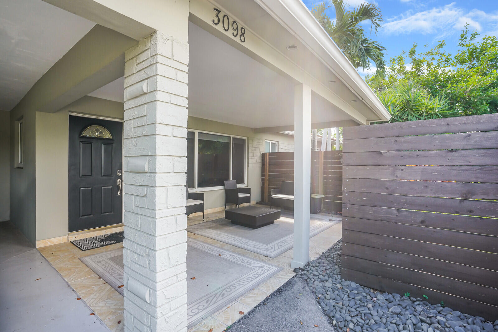 3098 Northeast 5th Avenue Boca Raton, FL 33431 - Photo 22 of 28 a view of a entryway door front of house