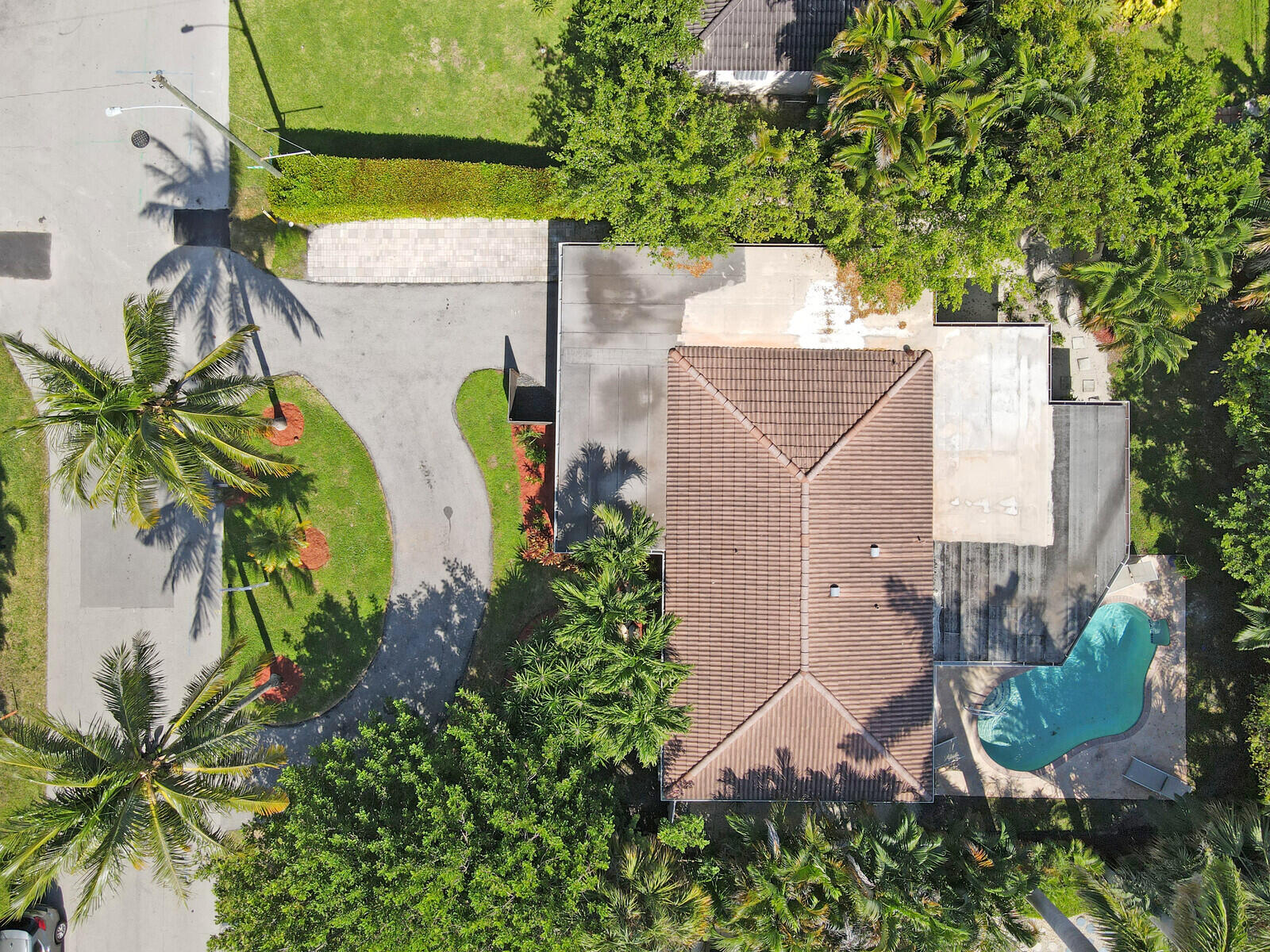 3098 Northeast 5th Avenue Boca Raton, FL 33431 - Photo 24 of 28 an aerial view of a house with garden space and plants