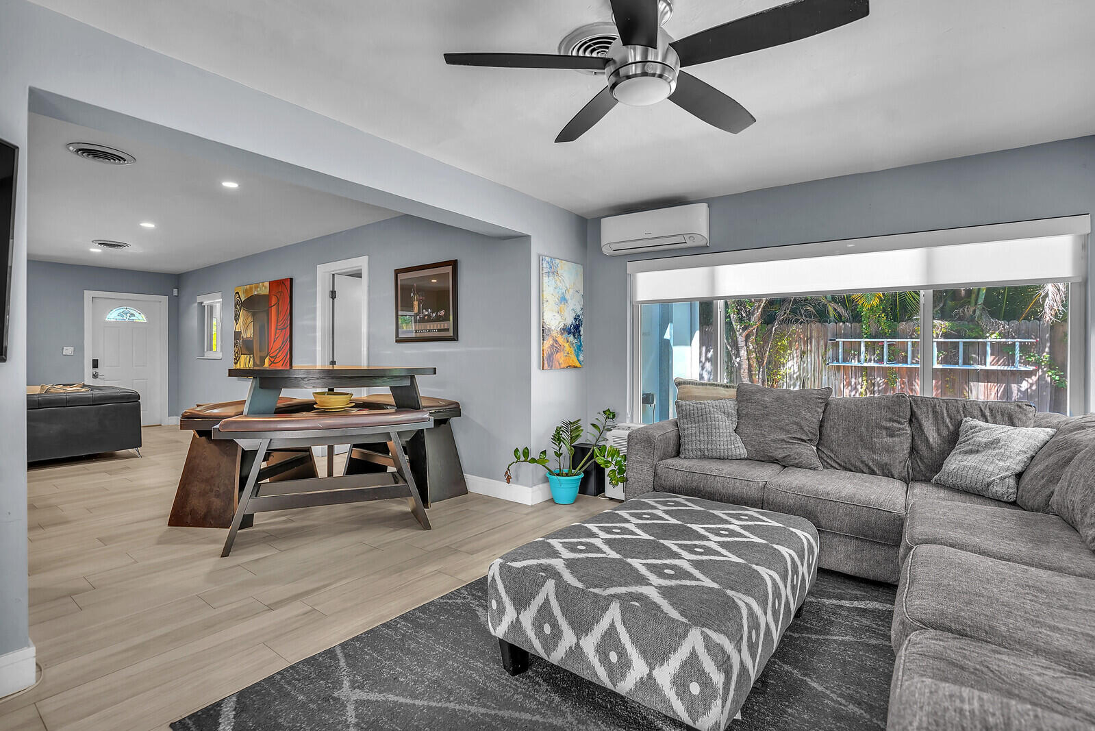 3098 Northeast 5th Avenue Boca Raton, FL 33431 - Photo 10 of 28 a living room with furniture and a large window