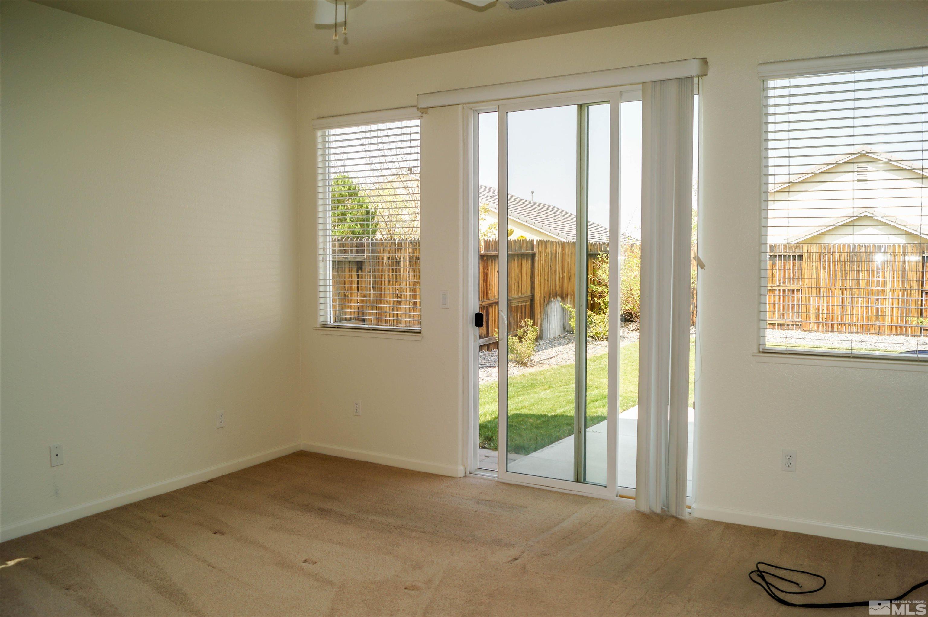 1747 Canyon Shadow Circle Reno, NV 89521 - Photo 14 of 14 a view of an empty room and window