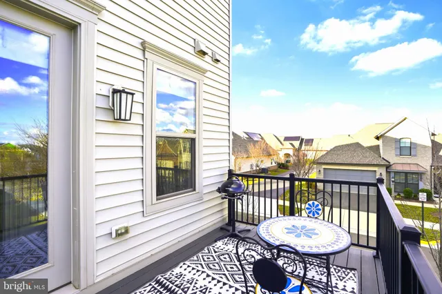 a view of a balcony patio and a wooden floor