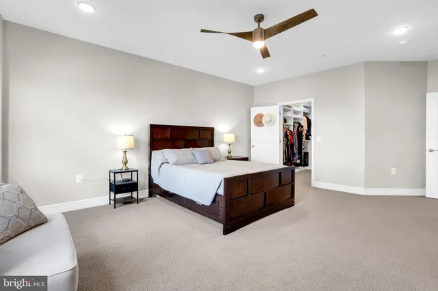 a bedroom with a bed and furniture