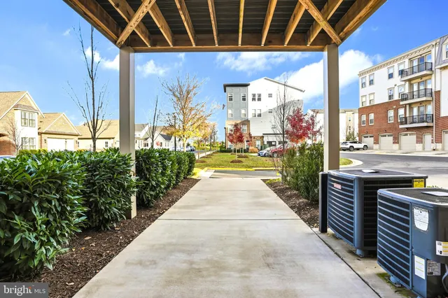 a view of swimming pool with a outdoor seating