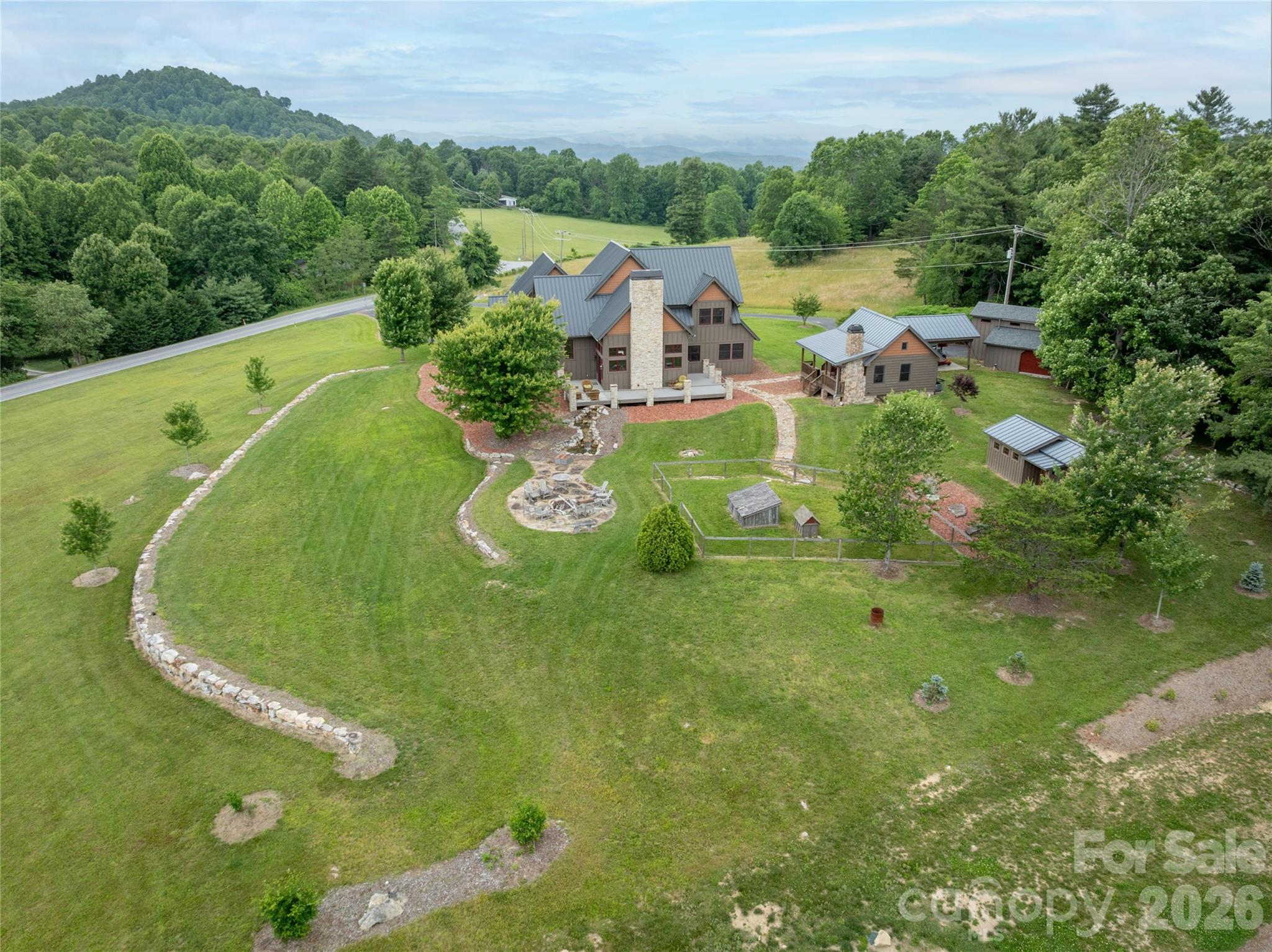 4862 Pinnacle Mountain Road Zirconia, NC 28790 - Photo 37 of 38 an aerial view of a house