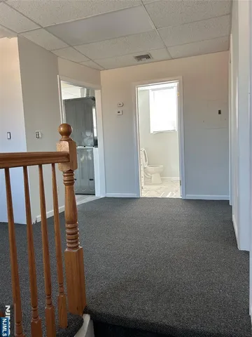 a view of hallway with stairs