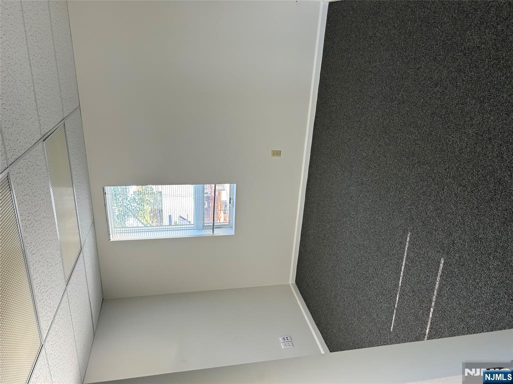 829 Main Street, Unit 2 Hackensack, NJ 07601 - Photo 8 of 8 an empty room with a window