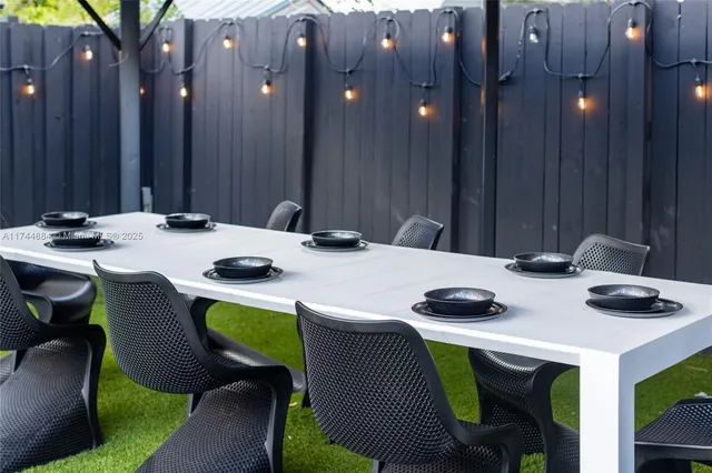 a bedroom with a bed and glass window