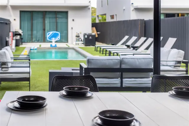 a bedroom with a bed and a mirror