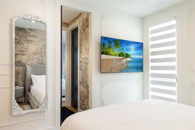 a kitchen with a table chairs stove and kitchen view