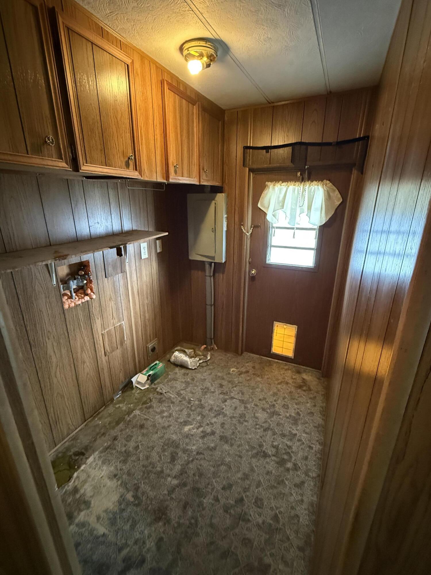 421 Stevens Road, Unit 20 Eagle Point, OR 97524 - Photo 11 of 22 a view of a garage with wooden door