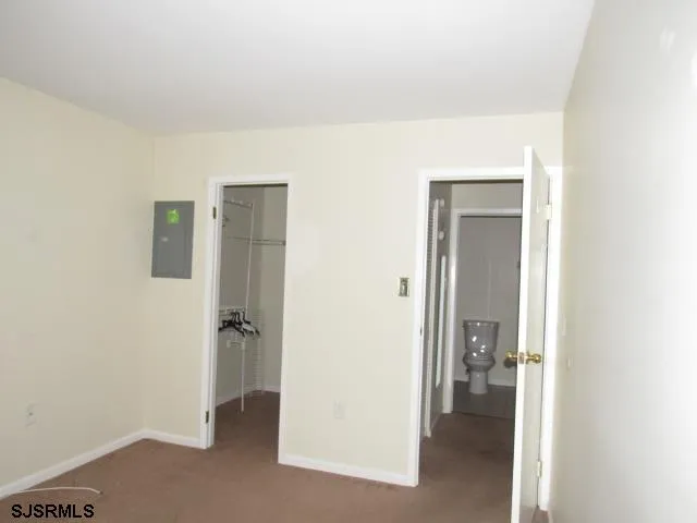 a view of a room with a wardrobe space