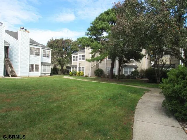 a house view with garden space