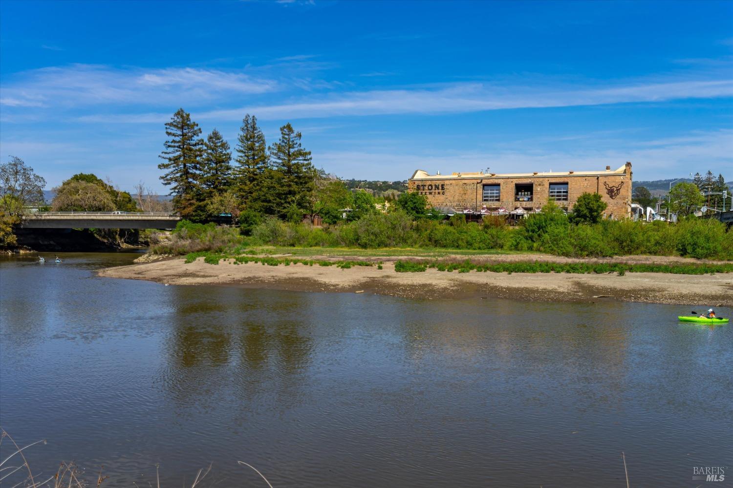 1777 McKinley Road Napa, CA 94558 - Photo 15 of 23 a view of building with river in front of it