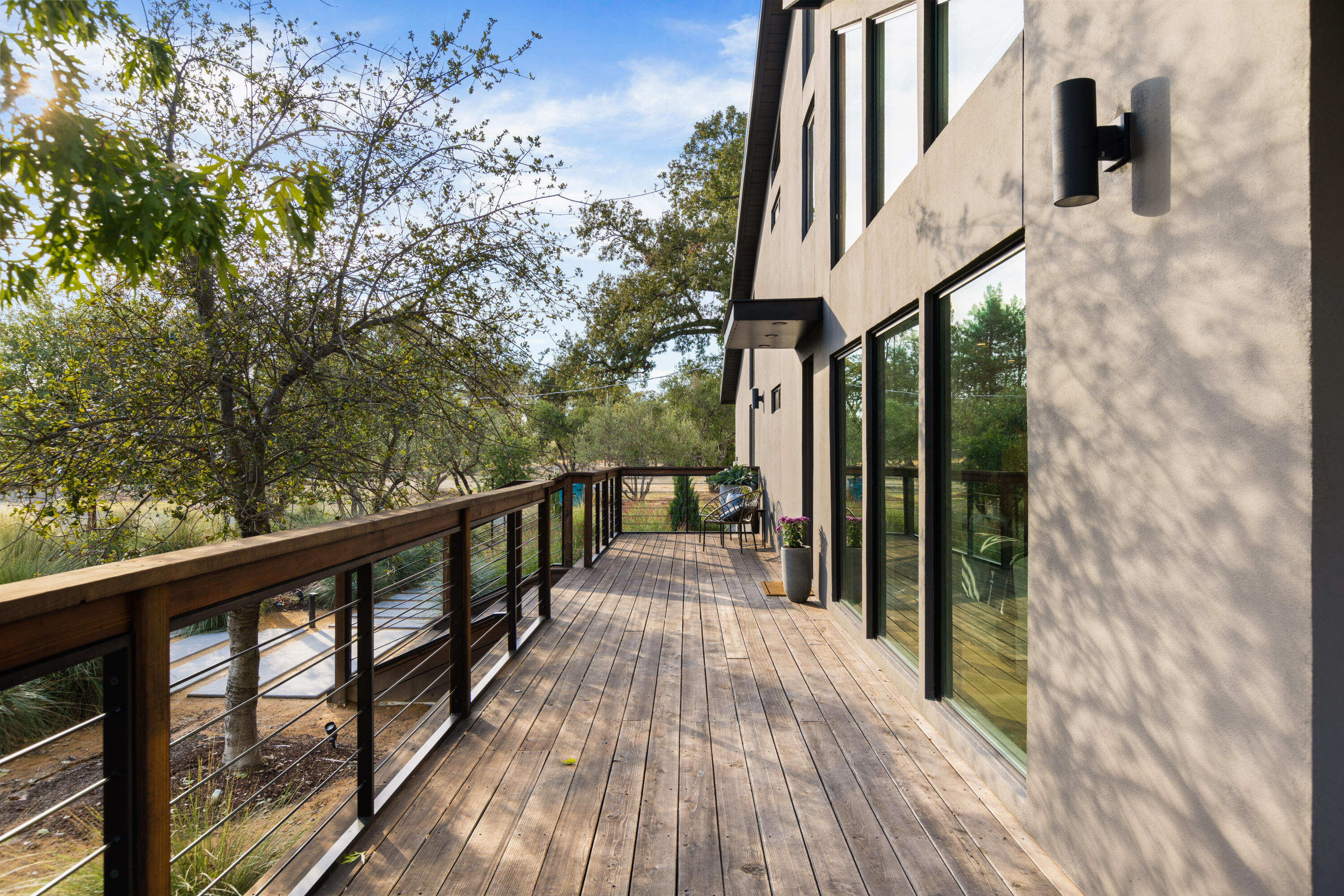 23204 Placid Road Palo Cedro, CA 96073 - Photo 3 of 71 a view of balcony with wooden floor and fence
