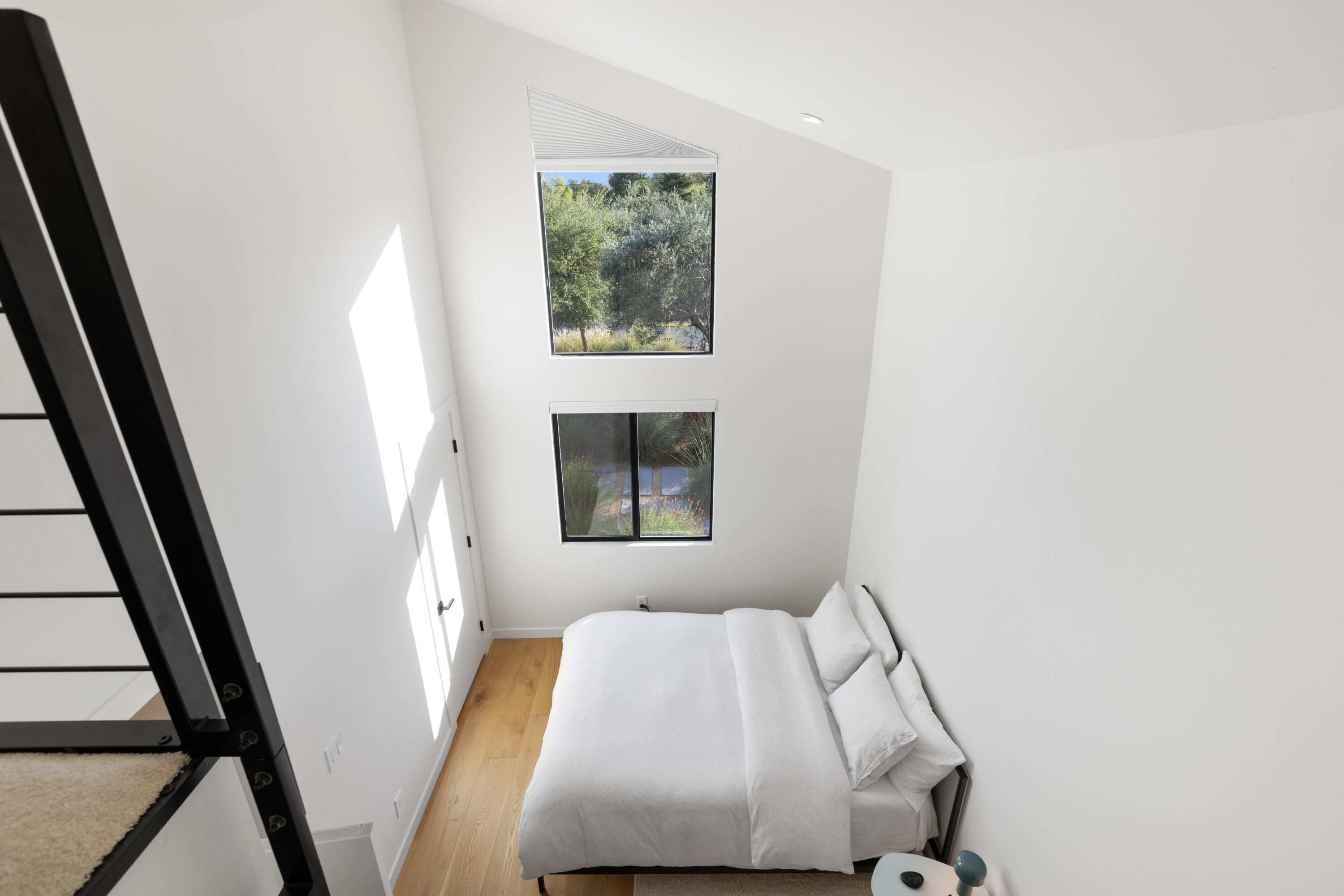 23204 Placid Road Palo Cedro, CA 96073 - Photo 33 of 71 a bedroom with a bed and a window