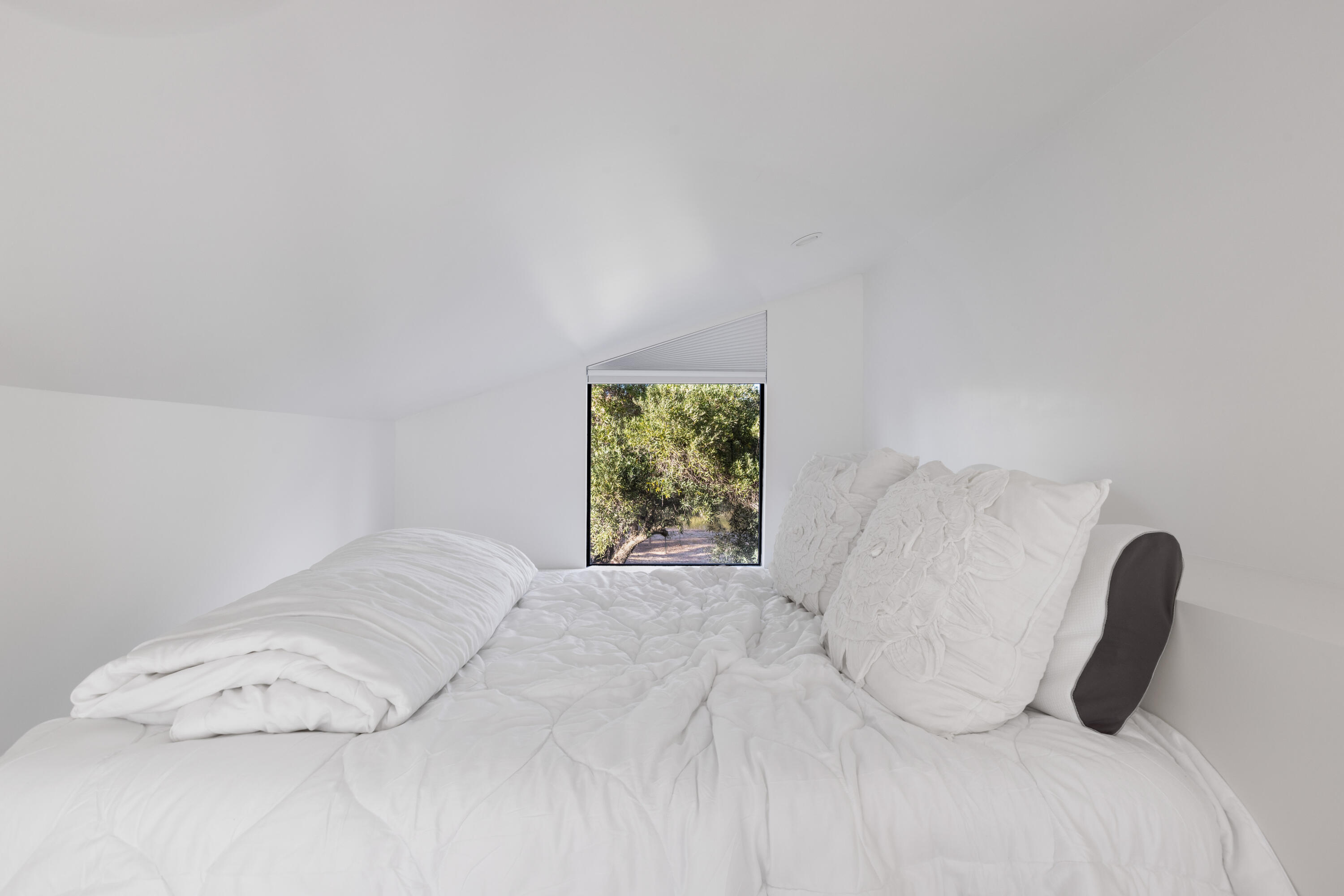 23204 Placid Road Palo Cedro, CA 96073 - Photo 35 of 71 a bedroom with a bed and a window