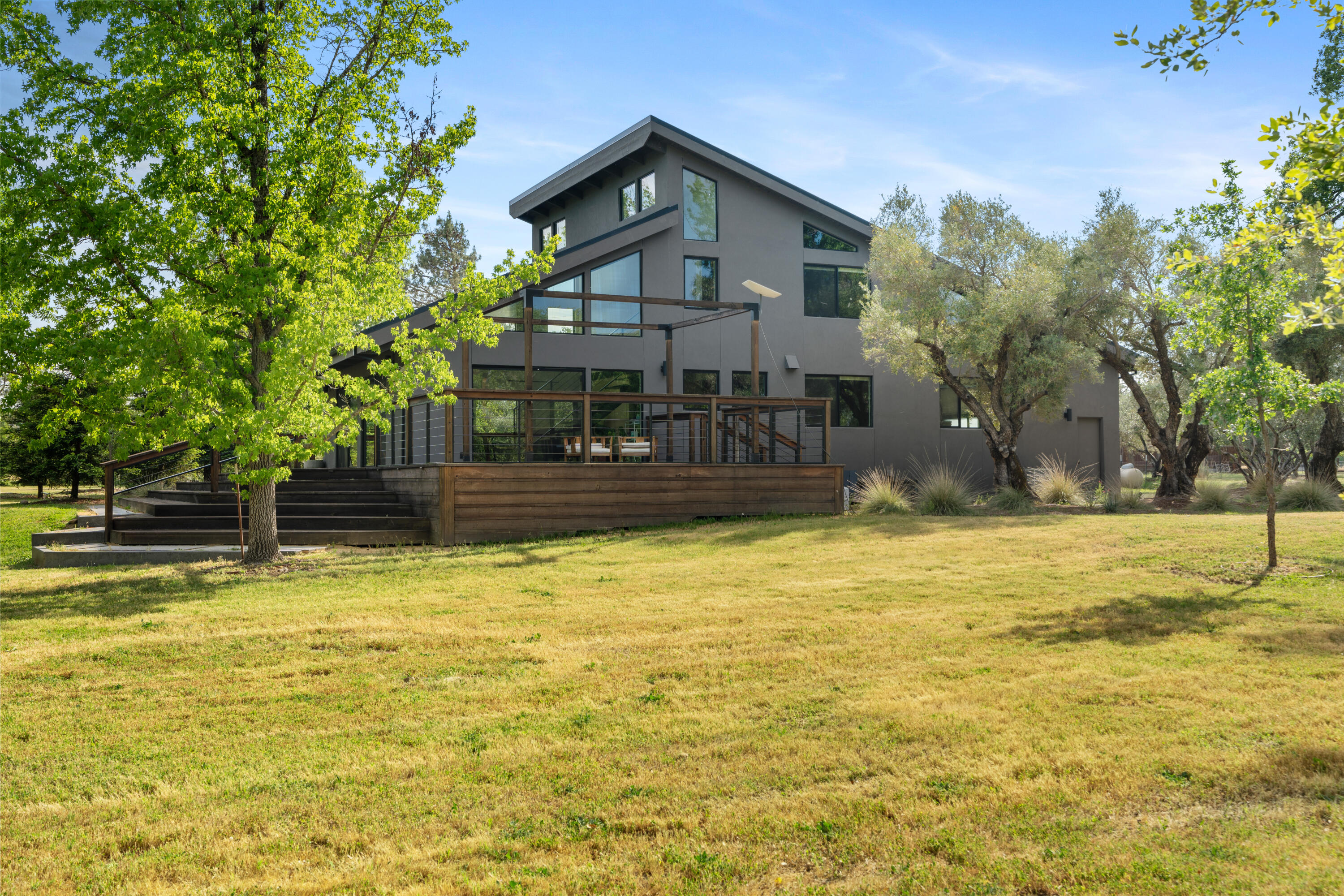 23204 Placid Road Palo Cedro, CA 96073 - Photo 52 of 71 a house view with swimming pool in front of it