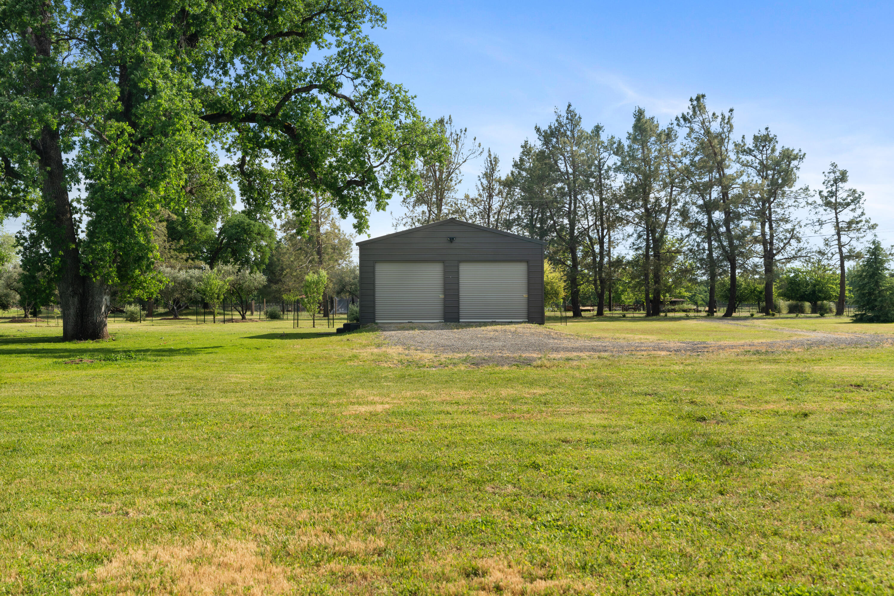 23204 Placid Road Palo Cedro, CA 96073 - Photo 58 of 71 a front view of a house with a yard