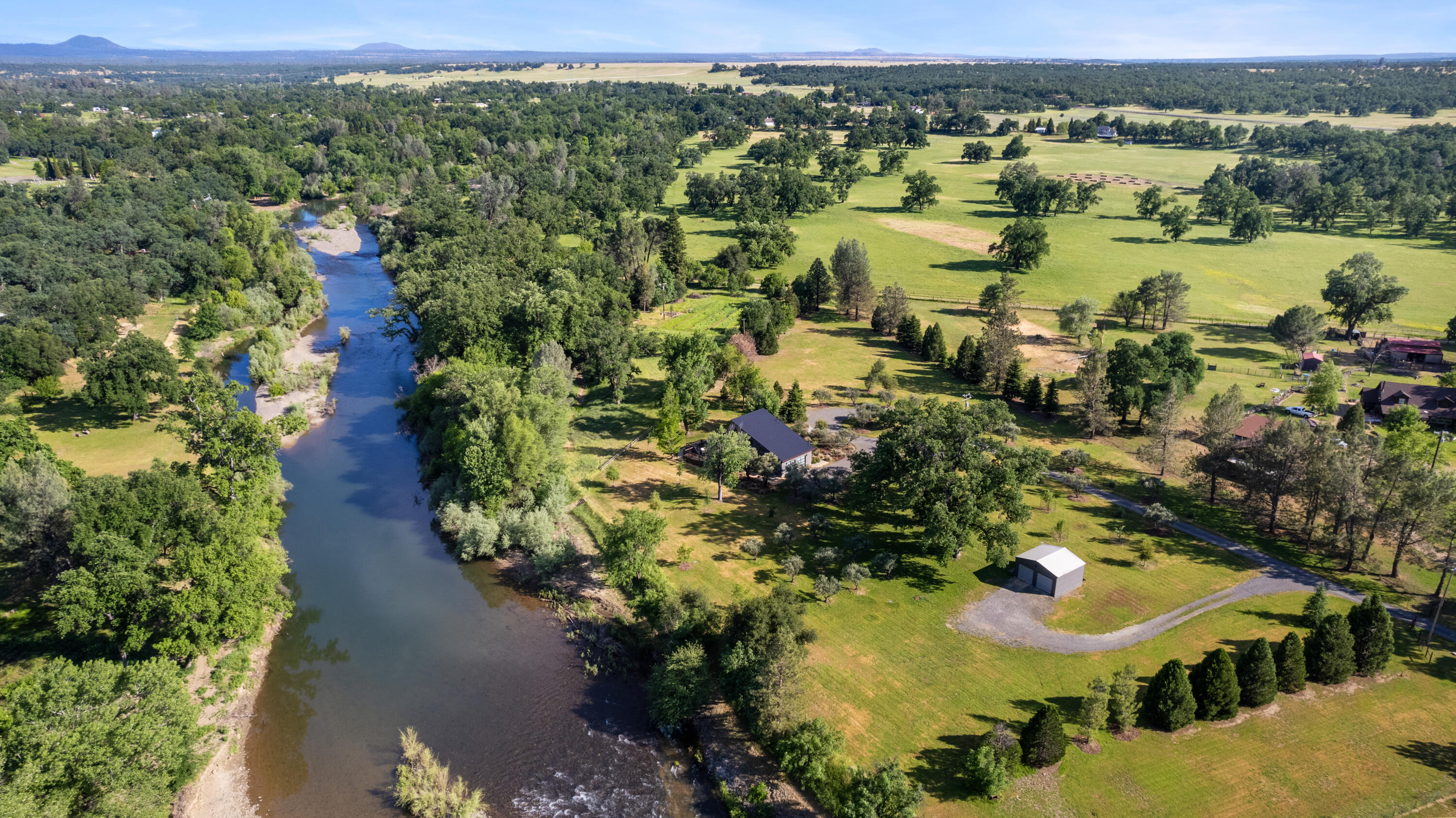 23204 Placid Road Palo Cedro, CA 96073 - Photo 64 of 71 an aerial view of residential houses with outdoor space and trees