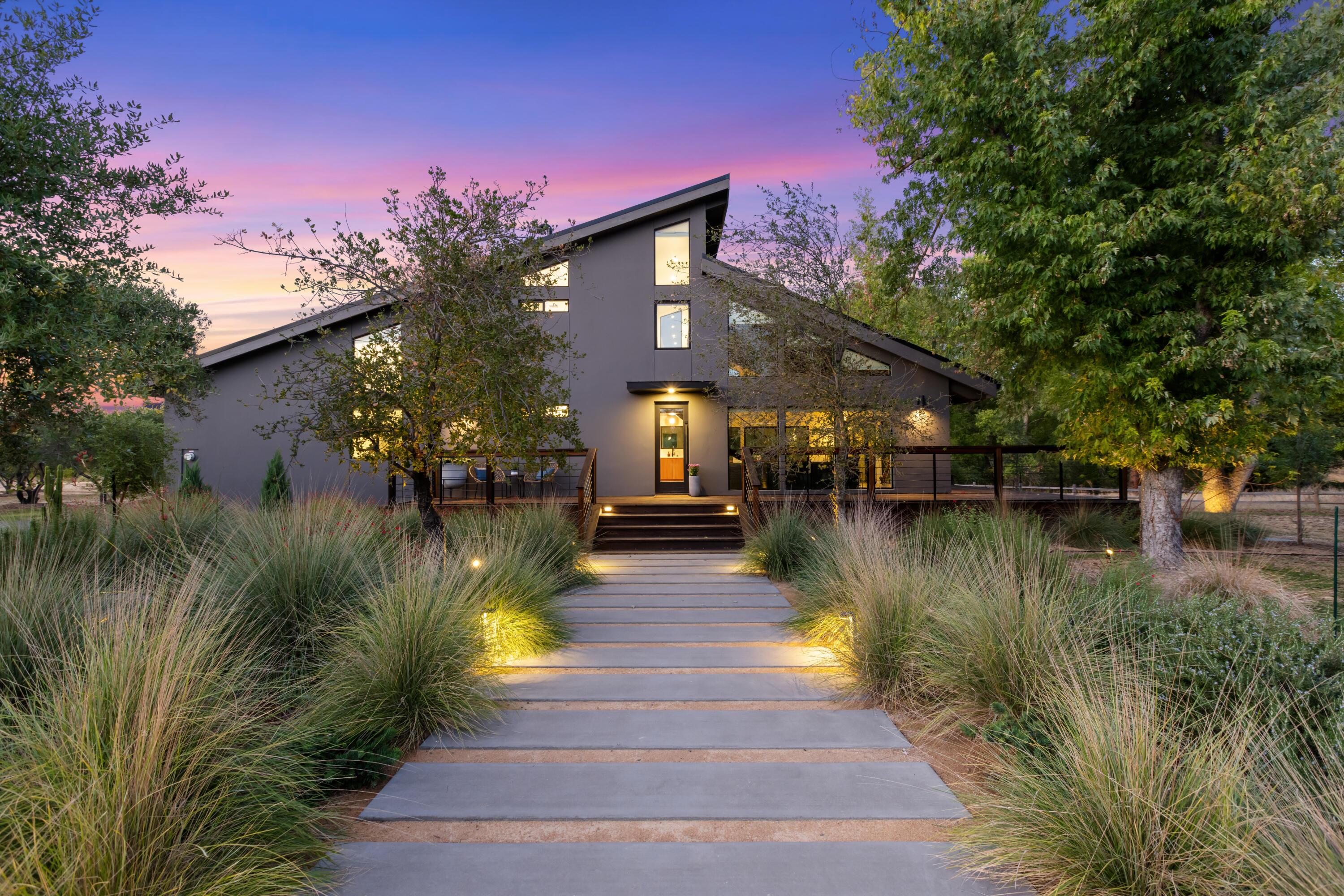 23204 Placid Road Palo Cedro, CA 96073 - Photo 68 of 71 a view of a house with swimming pool next to a yard