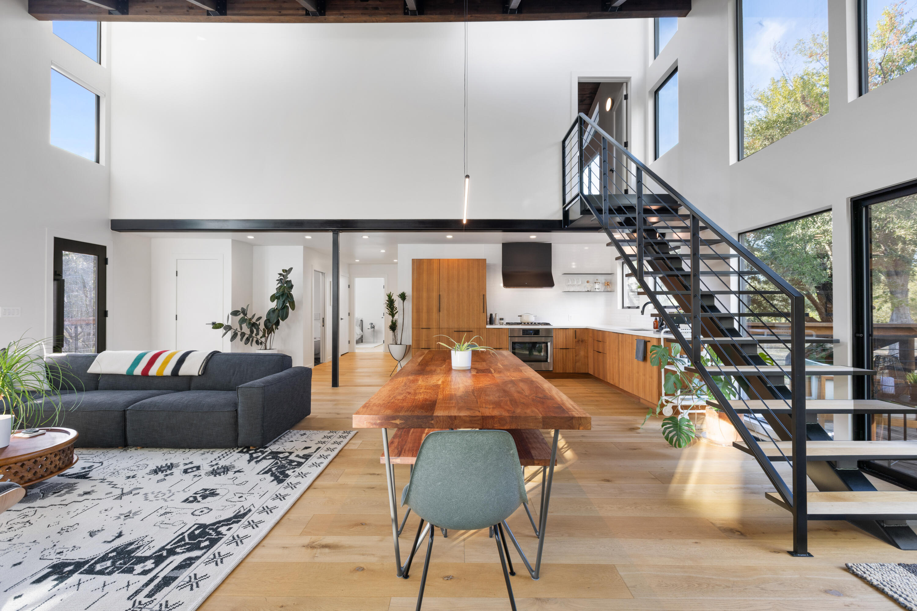 23204 Placid Road Palo Cedro, CA 96073 - Photo 9 of 71 a view of a livingroom with furniture and staircase