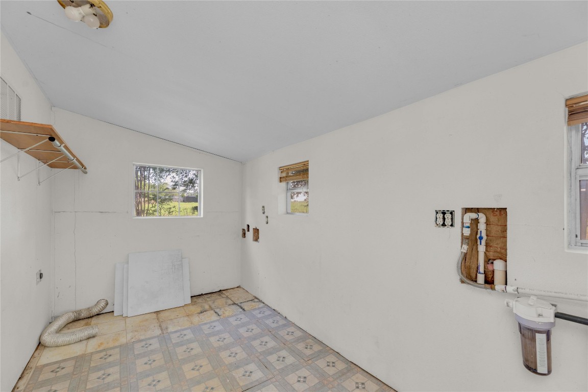 20235 Engelmann Lane Manor, TX 78653 - Photo 17 of 34 a view of a storage & utility room with a window